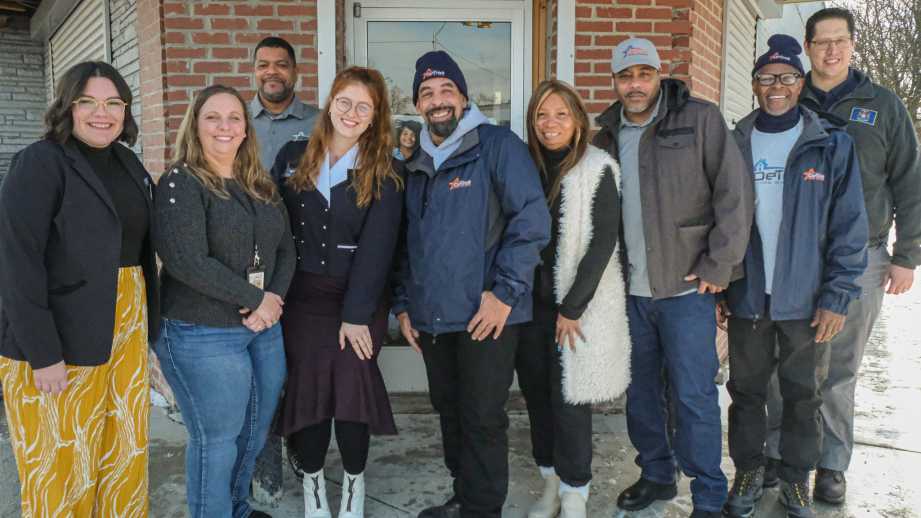 A group of diverse people smiling